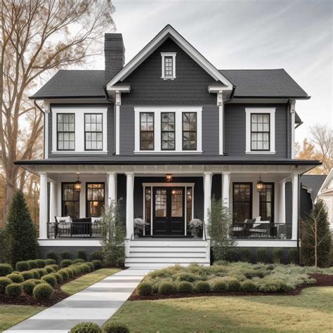 gray house black metal roof white trim|black and grey house exterior.